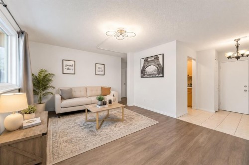 101-2111 14 Street, Calgary, AB - Indoor Photo Showing Living Room