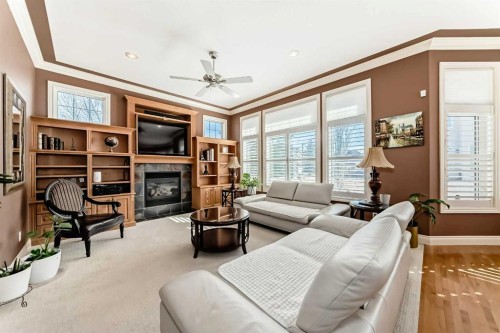 33 Evergreen Common Sw, Calgary, AB - Indoor Photo Showing Living Room With Fireplace