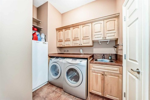 33 Evergreen Common Sw, Calgary, AB - Indoor Photo Showing Laundry Room