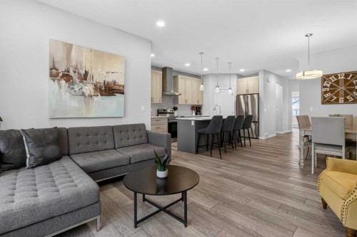 321 Magnolia Way Se, Calgary, AB - Indoor Photo Showing Living Room