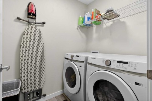 321 Magnolia Way Se, Calgary, AB - Indoor Photo Showing Laundry Room