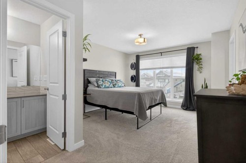 321 Magnolia Way Se, Calgary, AB - Indoor Photo Showing Bedroom