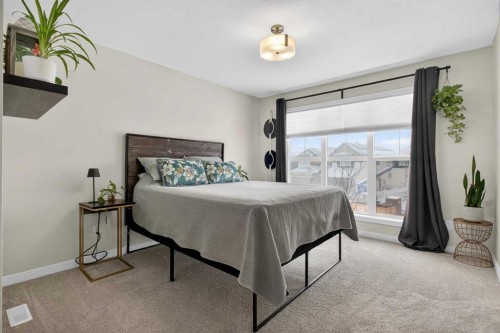 321 Magnolia Way Se, Calgary, AB - Indoor Photo Showing Bedroom