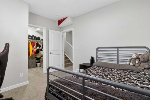 321 Magnolia Way Se, Calgary, AB - Indoor Photo Showing Bedroom