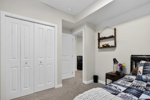 321 Magnolia Way Se, Calgary, AB - Indoor Photo Showing Bedroom