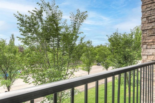 208-100 Cranfield Common Se, Calgary, AB - Outdoor With Balcony