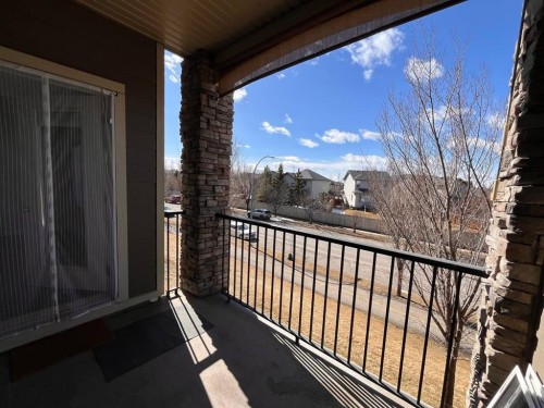 208-100 Cranfield Common Se, Calgary, AB - Outdoor With Balcony With Exterior