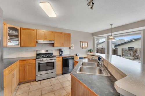 52 Covewood Green Ne, Calgary, AB - Indoor Photo Showing Kitchen With Double Sink