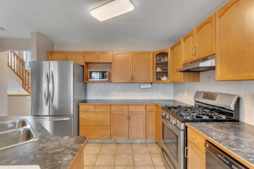 52 Covewood Green Ne, Calgary, AB - Indoor Photo Showing Kitchen With Double Sink
