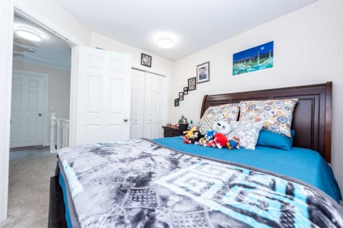 39 Tararidge Drive Ne, Calgary, AB - Indoor Photo Showing Bedroom