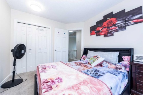39 Tararidge Drive Ne, Calgary, AB - Indoor Photo Showing Bedroom