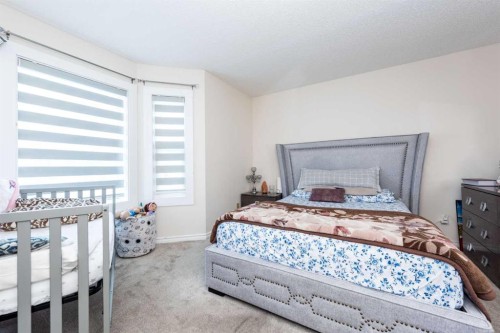 39 Tararidge Drive Ne, Calgary, AB - Indoor Photo Showing Bedroom