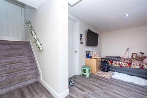39 Tararidge Drive Ne, Calgary, AB - Indoor Photo Showing Other Room