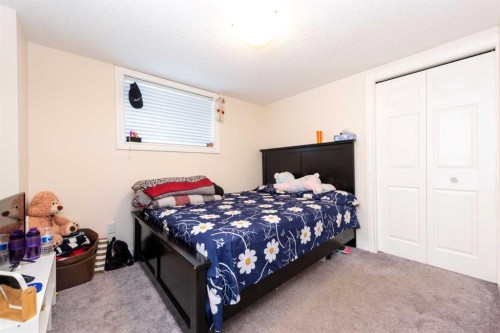 39 Tararidge Drive Ne, Calgary, AB - Indoor Photo Showing Bedroom