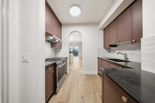 356 Greenwich Drive Nw, Calgary, AB - Indoor Photo Showing Kitchen With Upgraded Kitchen