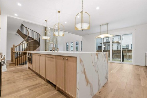 356 Greenwich Drive Nw, Calgary, AB - Indoor Photo Showing Kitchen With Upgraded Kitchen