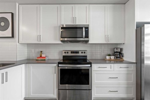 126 Seton Passage Se, Calgary, AB - Indoor Photo Showing Kitchen With Upgraded Kitchen