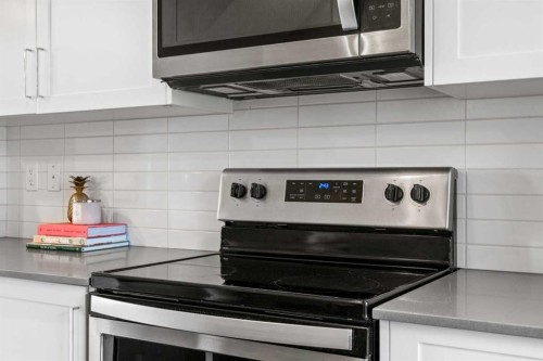 126 Seton Passage Se, Calgary, AB - Indoor Photo Showing Kitchen