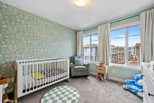 126 Seton Passage Se, Calgary, AB - Indoor Photo Showing Bedroom