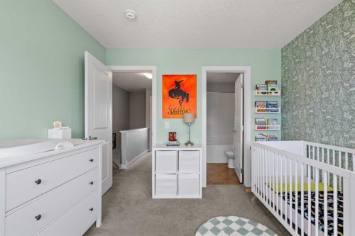 126 Seton Passage Se, Calgary, AB - Indoor Photo Showing Bedroom