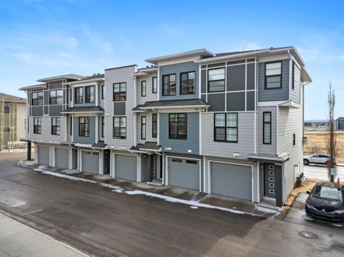 126 Seton Passage Se, Calgary, AB - Outdoor With Facade