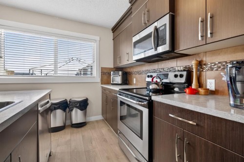 203 Fireside Parkway, Cochrane, AB - Indoor Photo Showing Kitchen
