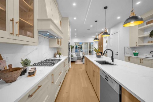 2435 52 Avenue Sw, Calgary, AB - Indoor Photo Showing Kitchen With Double Sink With Upgraded Kitchen