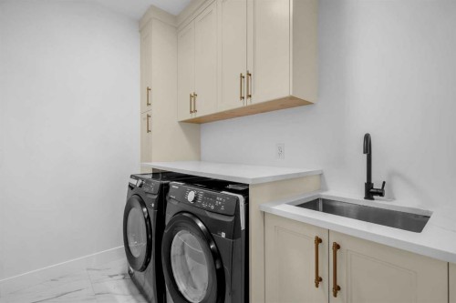 2435 52 Avenue Sw, Calgary, AB - Indoor Photo Showing Laundry Room