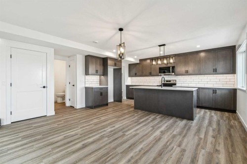 26A Poplar Ridge Close, Didsbury, AB - Indoor Photo Showing Kitchen With Upgraded Kitchen