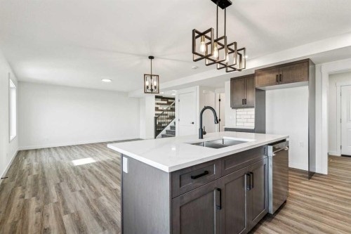 26A Poplar Ridge Close, Didsbury, AB - Indoor Photo Showing Kitchen With Double Sink