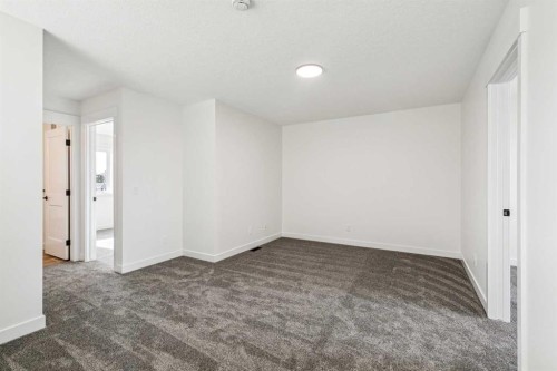 26A Poplar Ridge Close, Didsbury, AB - Indoor Photo Showing Other Room