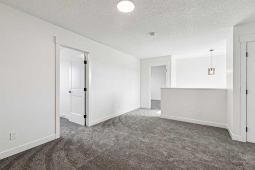 26A Poplar Ridge Close, Didsbury, AB - Indoor Photo Showing Other Room