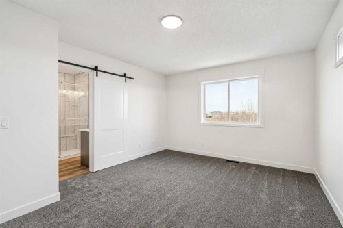 26A Poplar Ridge Close, Didsbury, AB - Indoor Photo Showing Other Room