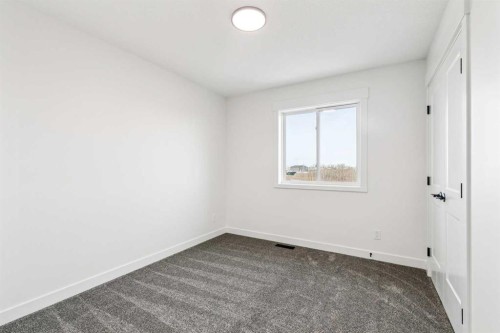 26A Poplar Ridge Close, Didsbury, AB - Indoor Photo Showing Other Room