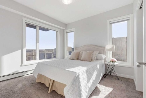 301-71 Shawnee Common Sw, Calgary, AB - Indoor Photo Showing Bedroom
