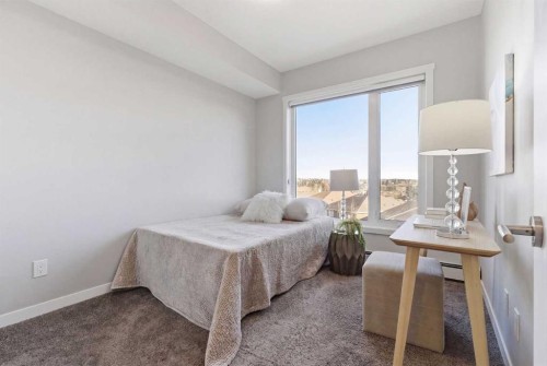 301-71 Shawnee Common Sw, Calgary, AB - Indoor Photo Showing Bedroom