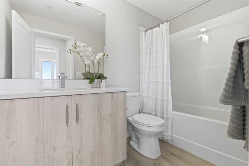 301-71 Shawnee Common Sw, Calgary, AB - Indoor Photo Showing Bathroom