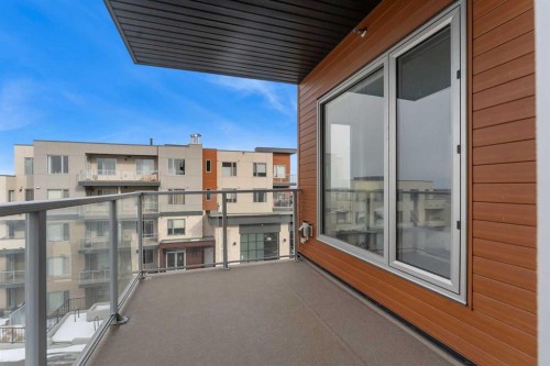 301-71 Shawnee Common Sw, Calgary, AB - Outdoor With Balcony With Exterior