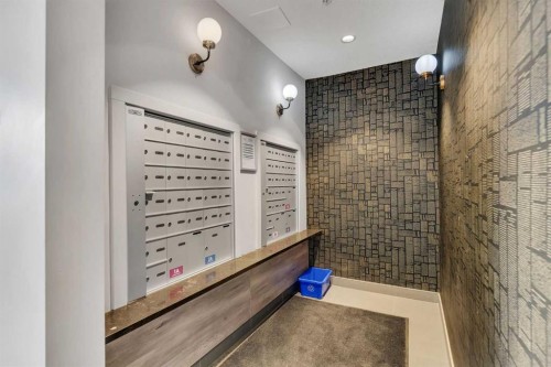 301-71 Shawnee Common Sw, Calgary, AB - Indoor Photo Showing Other Room