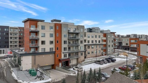 301-71 Shawnee Common Sw, Calgary, AB - Outdoor With Balcony