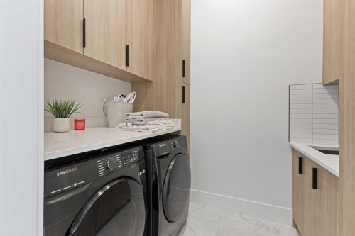 809 Drury Avenue Ne, Calgary, AB - Indoor Photo Showing Laundry Room