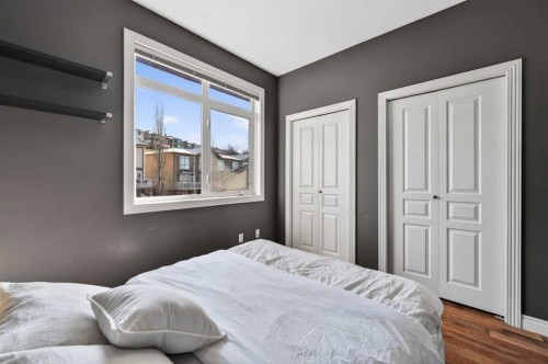 10-169 Rockyledge View Nw, Calgary, AB - Indoor Photo Showing Bedroom
