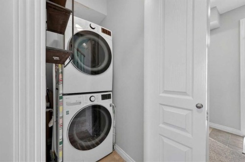 10-169 Rockyledge View Nw, Calgary, AB - Indoor Photo Showing Laundry Room