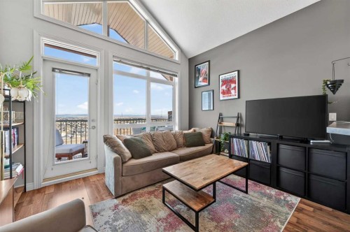 10-169 Rockyledge View Nw, Calgary, AB - Indoor Photo Showing Living Room