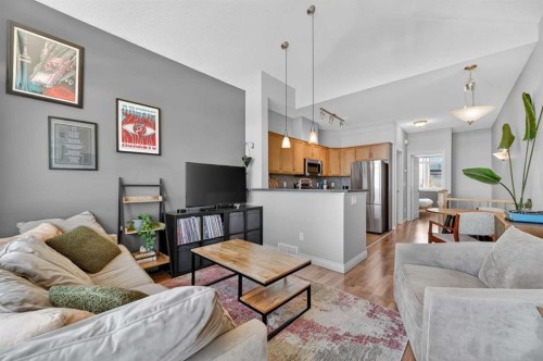 10-169 Rockyledge View Nw, Calgary, AB - Indoor Photo Showing Living Room