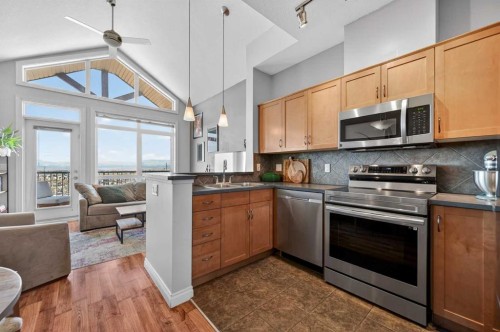 10-169 Rockyledge View Nw, Calgary, AB - Indoor Photo Showing Kitchen With Double Sink