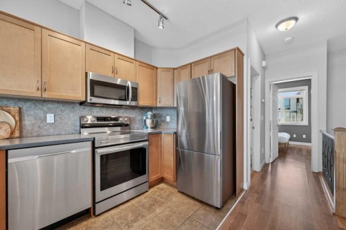 10-169 Rockyledge View Nw, Calgary, AB - Indoor Photo Showing Kitchen