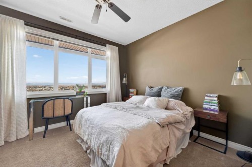 10-169 Rockyledge View Nw, Calgary, AB - Indoor Photo Showing Bedroom