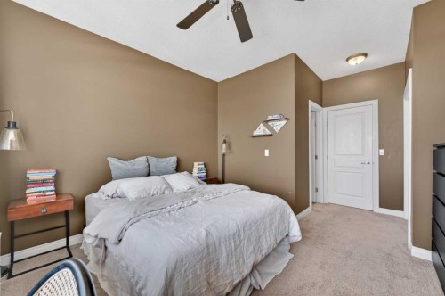 10-169 Rockyledge View Nw, Calgary, AB - Indoor Photo Showing Bedroom