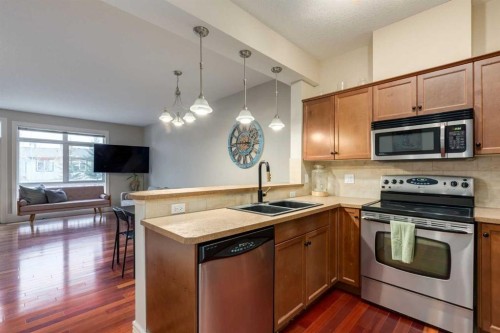 172 Rockyledge View Nw, Calgary, AB - Indoor Photo Showing Kitchen With Double Sink